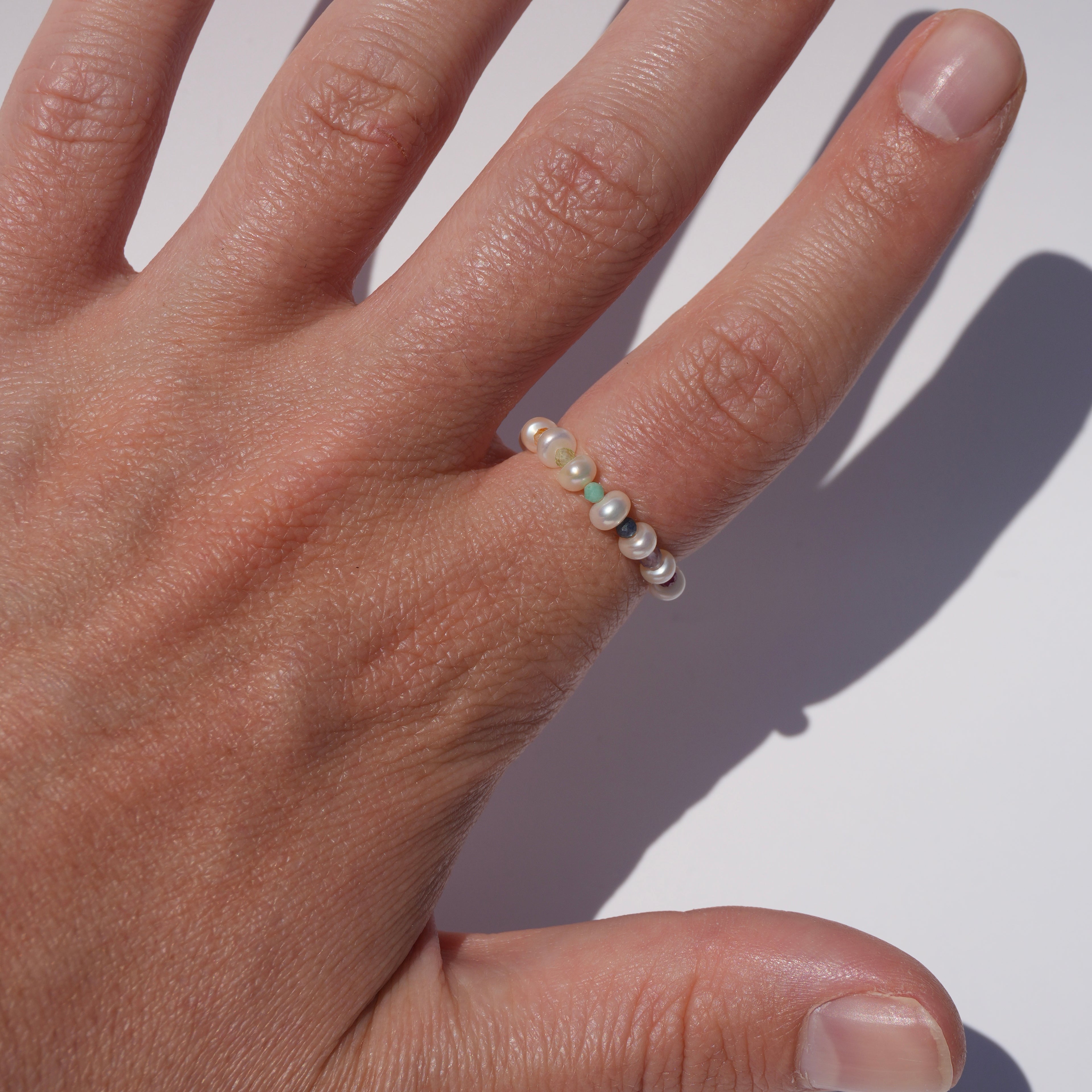 chunky pearl ring with gemstones