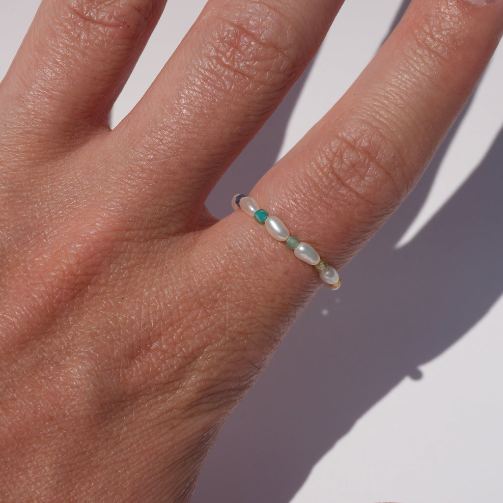 rice pearl ring with gemstones