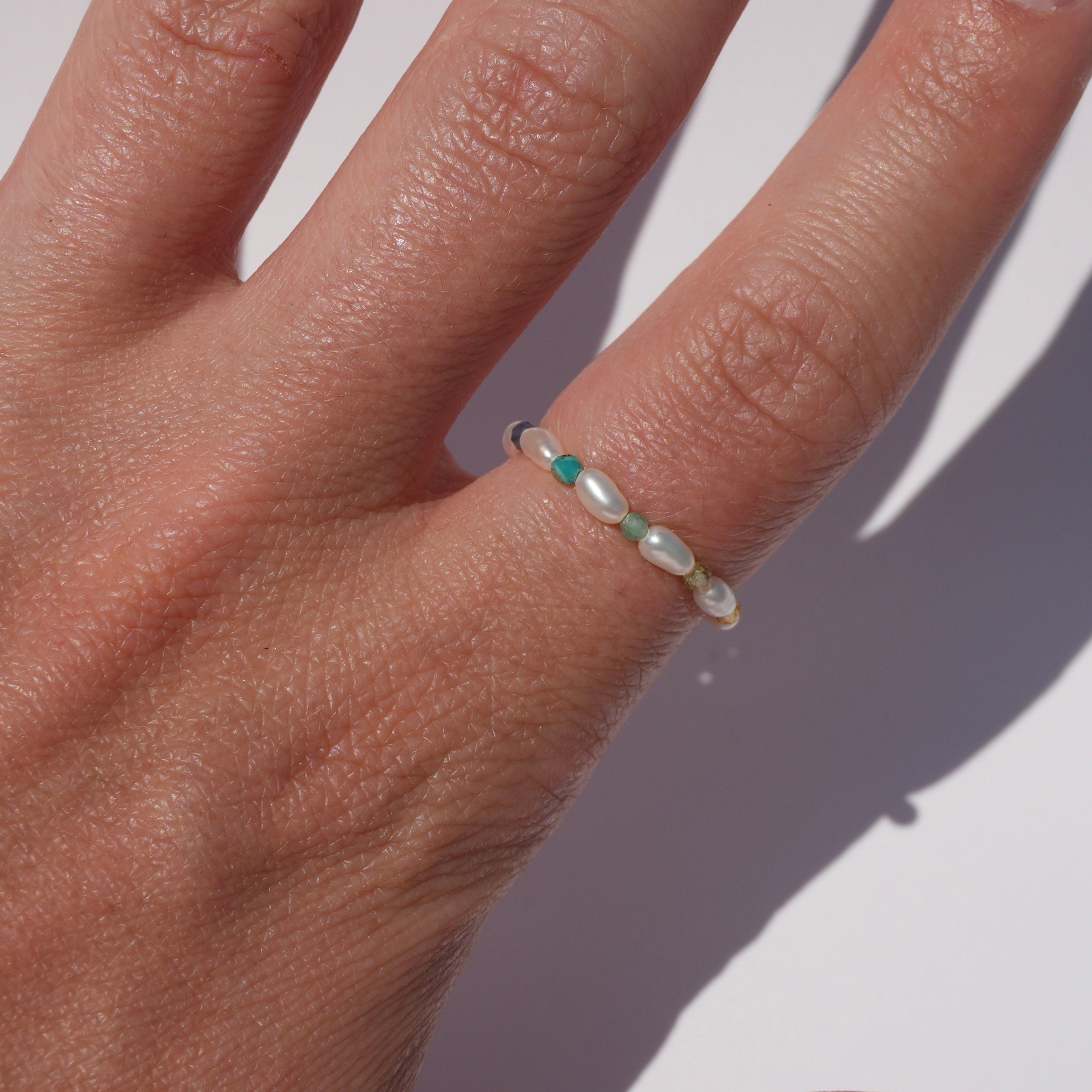 rice pearl ring with gemstones