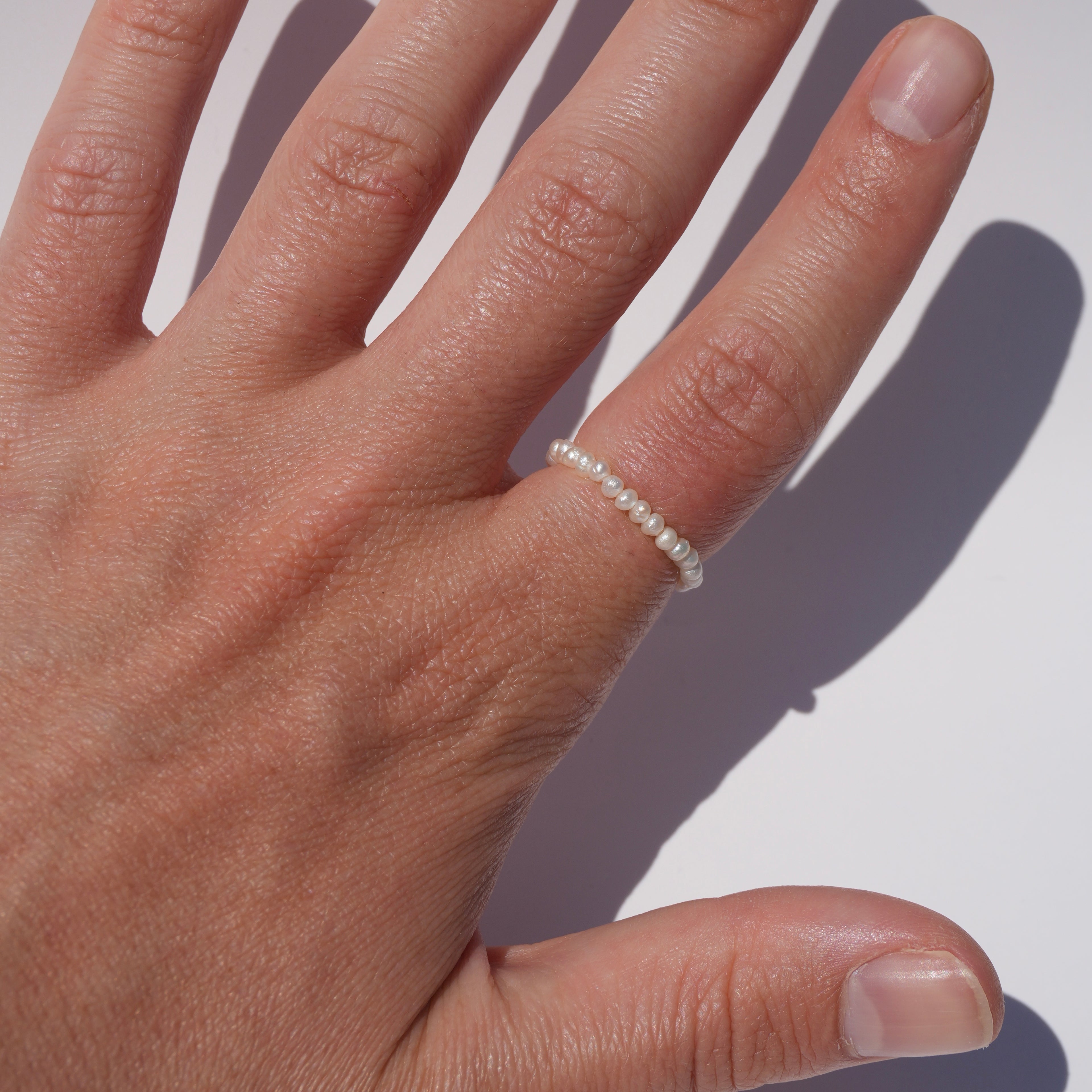 tiny pearl ring