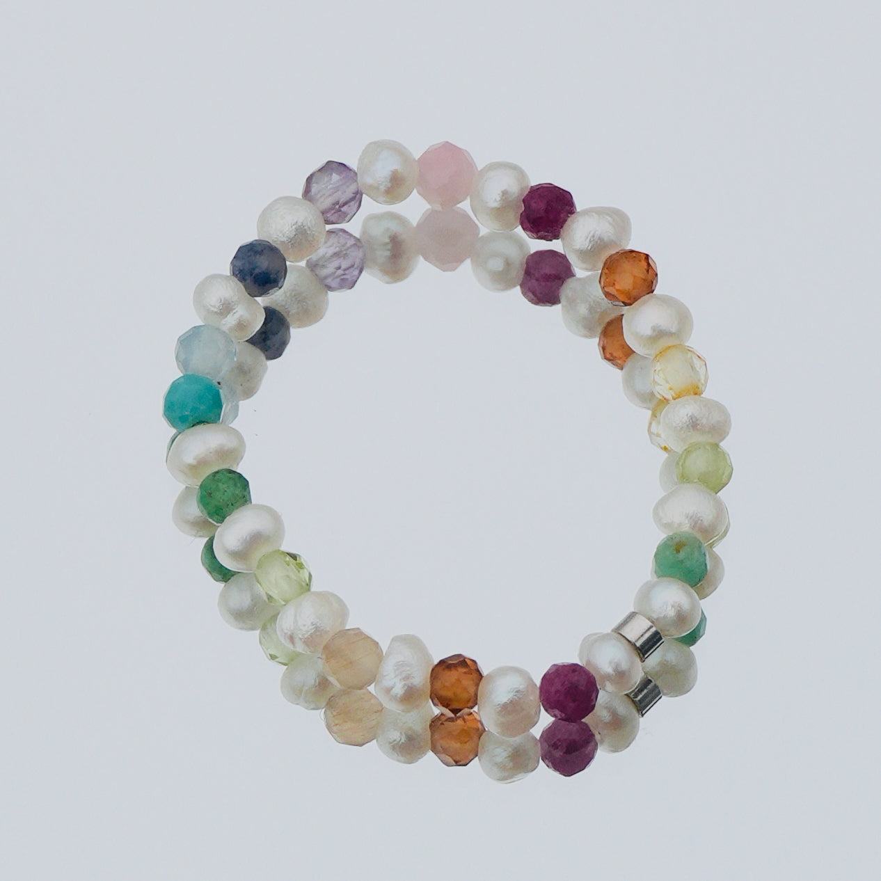 tiny pearl ring with gemstones
