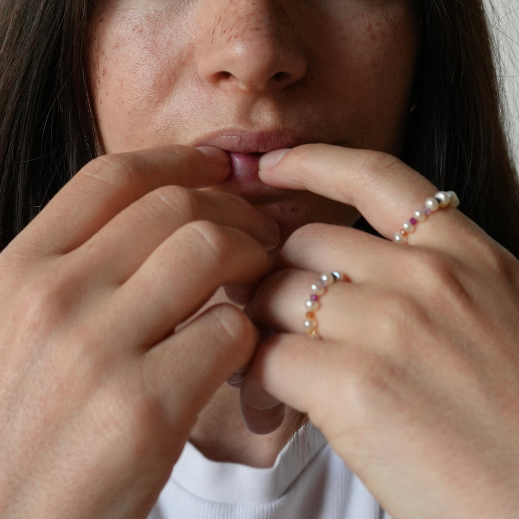 tiny pearl ring with gemstones